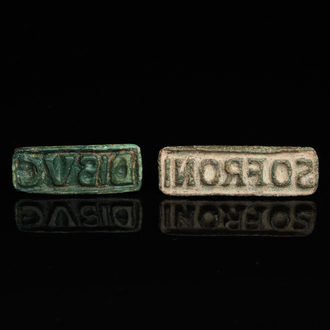 Two Roman bronze stamps inscribed 'SOFRONI' and 'DISUC', ca. 2nd C.