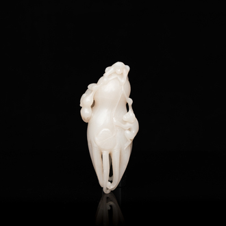 A Chinese white jade sculpture of a Buddha hand with monkeys, Qing