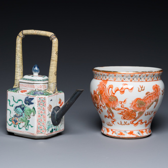 A Chinese famille verte 'Buddhist lions' teapot and a Thai market spittoon, Kangxi and later