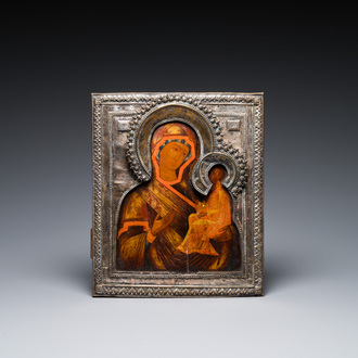 A Russian 'Mother of God' icon with silver riza, 19th C.