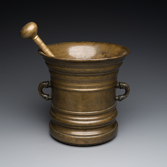 A large bronze mortar and pestle, probably France, 16/17th C.