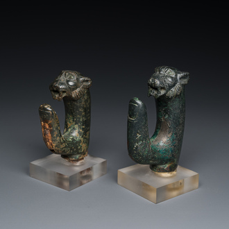 A pair of Roman bronze panther head fittings with finger-shaped hooks, ca. 2nd C.