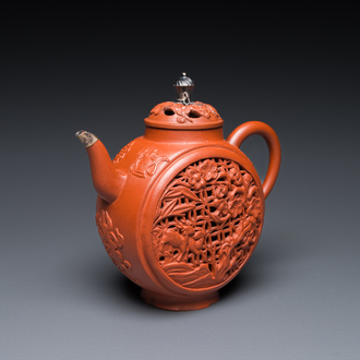 A Chinese reticulated double-walled Yixing stoneware teapot and cover with silver mounts, Kangxi