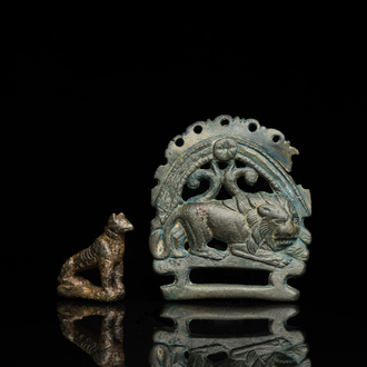 A Roman bronze model of a panther and a belt plate with a lion, ca. 2nd C.