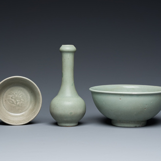 A Chinese celadon-glazed bottle vase and two bowls, Yuan/Ming