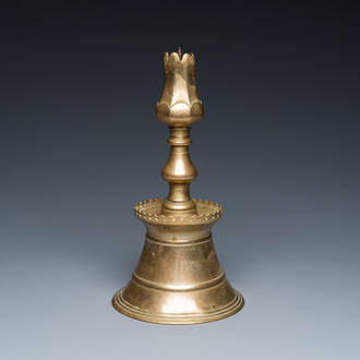 An Ottoman bronze candlestick with tulip-shaped sconce, Turkey, 17th C.