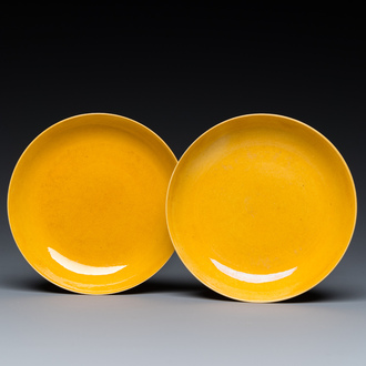 A pair of Chinese monochrome yellow-glazed plates, Tongzhi mark and of the period