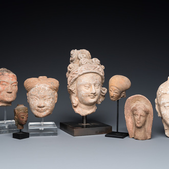 Eight various carved stone heads, incl. Chinese, Etruscan, Gandhara and Japanese