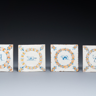 Four polychrome Dutch Delft tiles with animals in aigrette medallions, Haarlem, 17th C.