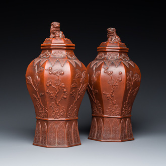 An extremely rare pair of Chinese Yixing stoneware octagonal vases and covers, Kangxi