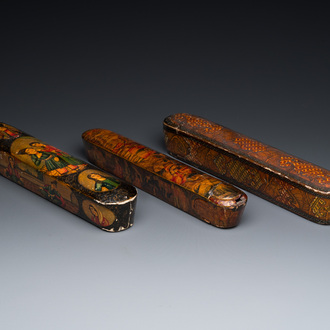 Three lacquered papier-maché pen boxes or qalamdans, Qajar, Persia, 19th C.