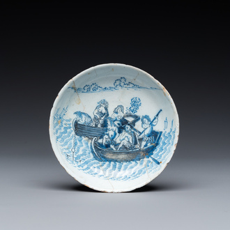 A rare Dutch Delft blue and white saucer dish with Normans in boats, 17th C.