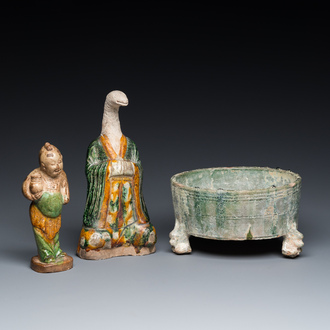 Two Chinese sancai-glazed figures and a green-glazed tripod censer, Han and later