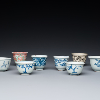 Eight Chinese mostly blue and white wine and tea cups, Ming