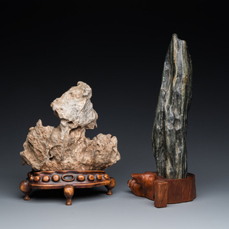 Two Chinese 'gongshi or 'scholar's rocks' on wooden stands, Ming or later