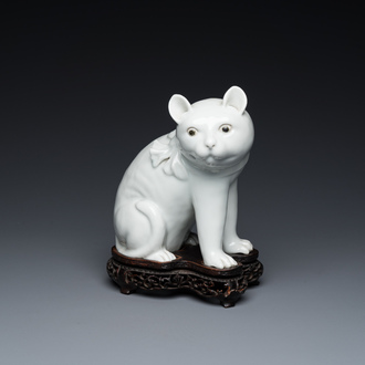 A Chinese blanc de Chine model of a cat on wooden stand, Republic