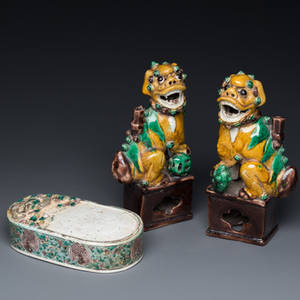 A pair of Chinese sancai incense stick holders and a verte biscuit inkstone, Kangxi or later