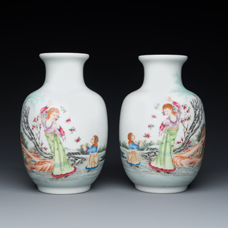 A pair of Chinese famille rose vases, Qianlong mark, 20th C.