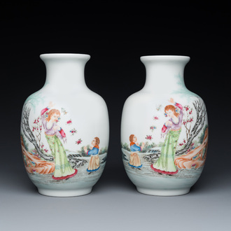 A pair of Chinese famille rose vases, Qianlong mark, 20th C.
