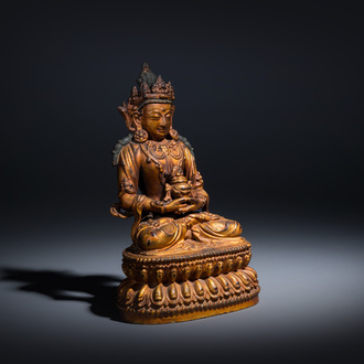 A fine Chinese gilt-lacquered bronze sculpture of Buddha Amitayus, 18th C.