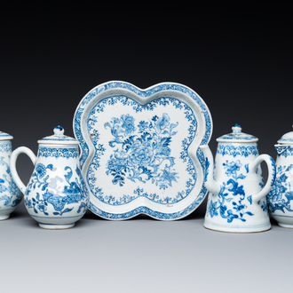 A rare Chinese blue and white set of two jugs and two casters on stand, Qianlong