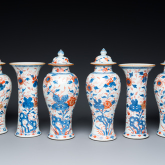 A Chinese Imari-style garniture of six vases with floral design, Kangxi