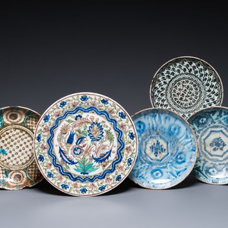 Five blue and white and polychrome Islamic pottery dishes, Qajar, Persia, 19th C.