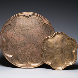 Two large Qajar engraved brass dishes, one with the portrait of Shah Abbas, Persia, early 20th C.