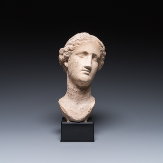 A Roman limestone head of a female, probably Pannonia province, 1st/4th C.