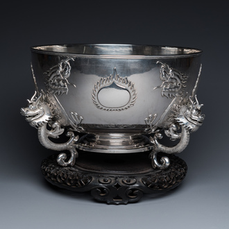 A large Chinese silver bowl resting on three dragon feet, marked for Kun He, Shanghai, 19/20th C.