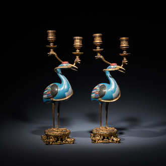 A pair of Chinese cloisonné cranes with gilt bronze candelabra mounts, 18/19th C.