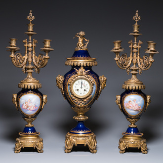A large three-piece Sèvres-style clock garniture with gilt bronze mounts, France, 19th C.