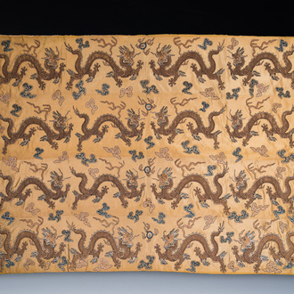 A Chinese yellow-ground silk embroidery decorated with sixteen five-clawed dragons, Da Ming 大明 mark, 19th C.