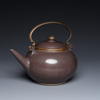 A Chinese polished purple Yixing stoneware teapot and cover for the Thai market, Gong Ju 貢局 mark, 19th C.