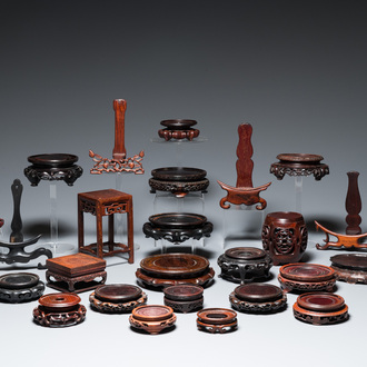 A collection of 25 fine Chinese wooden stands, 19/20th C.