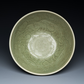 A large Chinese Longquan celadon bowl with underglaze design, Ming