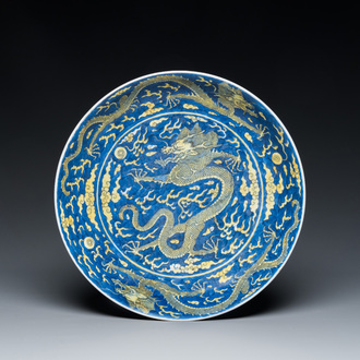 A Chinese blue-ground yellow-enamelled 'dragon' dish, Qianlong mark and of the period