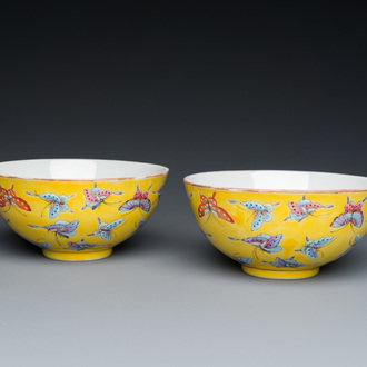 A pair of Chinese famille rose yellow-ground 'butterfly' bowls, Tongzhi mark and of the period