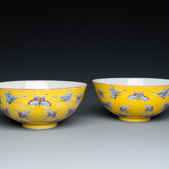 A pair of Chinese famille rose yellow-ground 'butterfly' bowls, Tongzhi mark and of the period