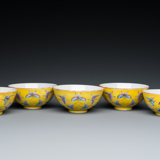 Five Chinese famille rose yellow-ground 'butterfly' bowls, Tongzhi mark and of the period