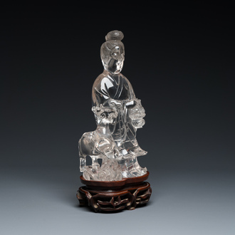 A large Chinese rock crystal sculpture of Lan Caihe, 19th C.