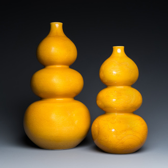 Two Chinese monochrome yellow-glazed triple gourd vases with incised designs of lotus scrolls and dragons, Longqing mark, 19th C.