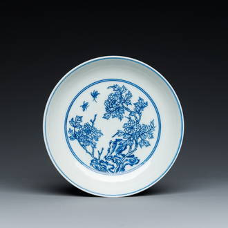 A Chinese blue and white floral plate, Yongzheng mark and of the period