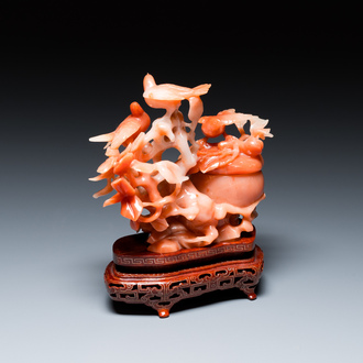A Chinese carnelian agate sculpture of a vase with branches and birds, 20th C.