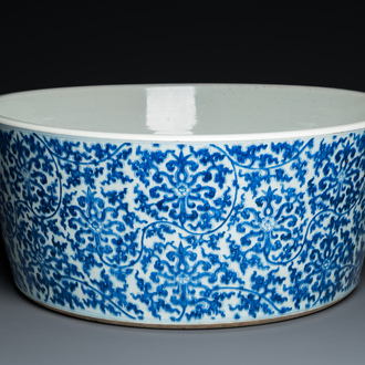 An exceptionally large Chinese blue and white basin with floral scrolls, Kangxi