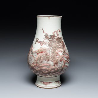 A Chinese copper-red 'dragon and carp' vase, Kangxi mark, 20th C.