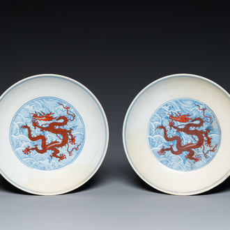 A pair of Chinese iron-red and underglaze-blue 'dragon' dishes, Qianlong mark and of the period