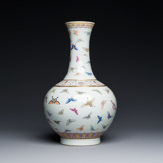 A Chinese famille rose 'butterfly' bottle vase, Guangxu mark and of the period