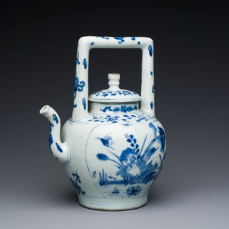 A large Chinese blue and white 'crane and lotus' wine ewer and cover, Transitional period