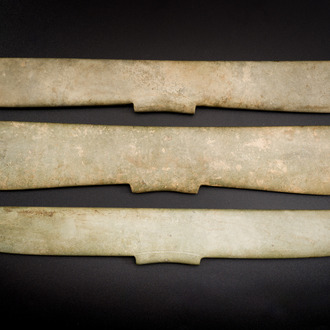 Three Chinese archaic calcified jade pendants, probably Liangzhu culture